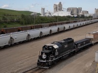 What the saying, "always keep your camera with you"...just running errands on a Thursday afternoon, I found IC heritage unit 7601 and slug 601 switching Bissell yard. The Edson sub mainline is in the middle of the photo and in the back is the Heidelberg Materials concrete plant (previously Inland Cement).