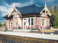 Did you go to the "...tree museum, and pay a dollar and a half to see them?"
<br>
<br>
Former CN station at Maple, Ontario. Still quite picturesque with the trees surrounding the station grounds. This would've been shortly after GO renovated the building. What's old is new again. One would think you're in the country, not within the sprawling GTA.
<br>
<br>
Visit today, and Joni Mitchell's lyrics are 100% true than ever..."...don't it always go, that you don't know what you've got 'till it's gone. Paved paradise, put up a parking lot".
<br>
<br>
Of days gone by:
<br>
<br>
<a href="http://www.railpictures.ca/?attachment_id=7285> CP led VIA Canadian #2 (sdforty photo)</a>
<br>
<br>
<a href="http://www.railpictures.ca/?attachment_id=40459 ">VIA Train #9 from 1986 (First954 photo)</a>