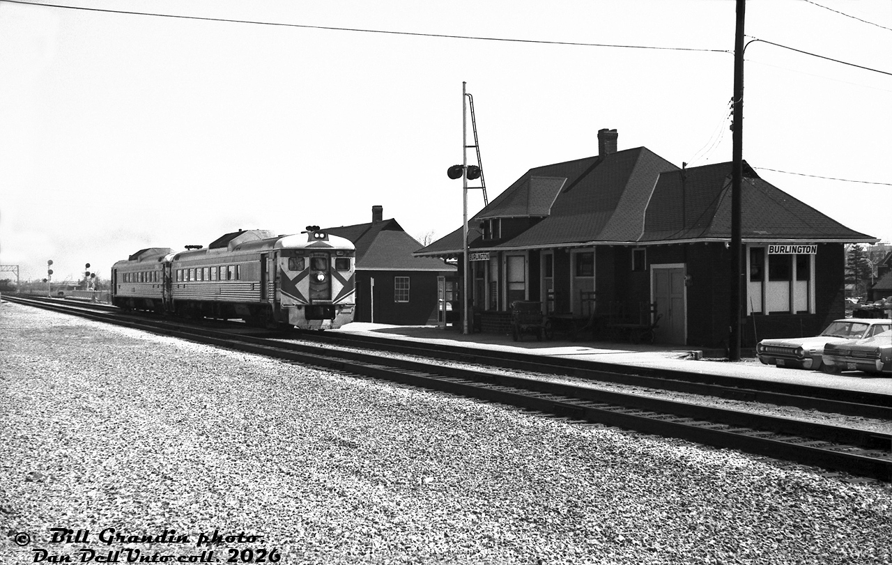 CP Rail RDC-2 units 9115 and 9103 handle the daily CP-TH&B-PC Budd RDC train from Toronto to Buffalo (operating as CP #321 over this leg of the trip), heading westbound over CN's Oakville Subdivision making their station top at the CN Burlington (Freeman) Station. This was just after the Brant Street grade separation, with fresh clean ballast visible, and was around the same time (or perhaps the same day) that Bill shot a CN freight coming off the Halton Sub from the same spot.

A CP timetable from April 1972 shows this train, CP #321, departing Toronto Union Station at 8:50am and operating over CN's Oakville Sub (via trackage rights, with a flag stop at Oakville station as needed), arriving at Burlington Station around 9:30am. Its next station stop was at the Toronto, Hamilton & Buffalo's Hamilton Station at 9:50am, before continuing over the TH&B and Penn Central (as train #376) to Buffalo NY via Fort Erie.

Bill Grandin photo, Dan Dell'Unto collection negative.