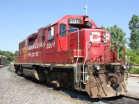 CP 3011, an EMD GP38AC is seen taking a break from assembling a consist of rail cars for the Toyota plant located across the street from Hagey Yard.