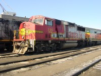 2/7/03 GMD London built BNSF ex Sante Fe GP60M #146 sits on the outbound shop track at Mac Yrd. 146 is coupled to a BNSF GP9B 1700
The once proud Sante Fe Warbonnet painted in the (then new) Super Fleet livery(thanks Mike Haverty) is a shadow of its former self. BNSF 146 is still on the roster, but now downgraded to local service and are designated GP60M-3
The GP60'S were one of the last high horsepower locomotives built by GMD.