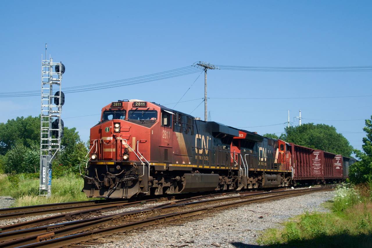 Almost 42 years to the day since John Eull shot a transfer crossing the Lachine Canal, transfer job CN 527 crosses the canal on a new bridge. The relatively new signals at left are for trains leaving the East Side Canal Bank Spur.