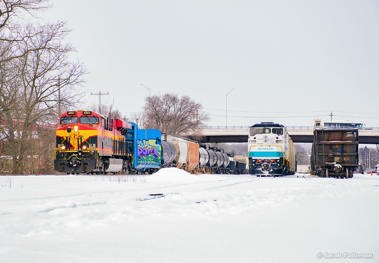A pair of former Metrolink F59 locomotive shells, recently purchased by Ontario's Metrolinx, are tied down in the yard at Galt, set off on account of air issues effecting their movement on 2-230.  With the issues sorted, setoff complete, and coffees on board, 2-230 finally gets underway towards Toronto.