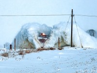 I title this one <b>The Man and the Monster.</b> A railfan stands his ground at Mapleton Line as the steel beast flinging snow from the right of way closes in at track speed. Truly one of the most dramatic scenes I've ever captured. Plows are fun to capture and some of the best frames are captured from a distance, magnifying the brilliance and sheer power of a pair of 1950 era diesels propelling a century old wedge plow through a snow drift. 