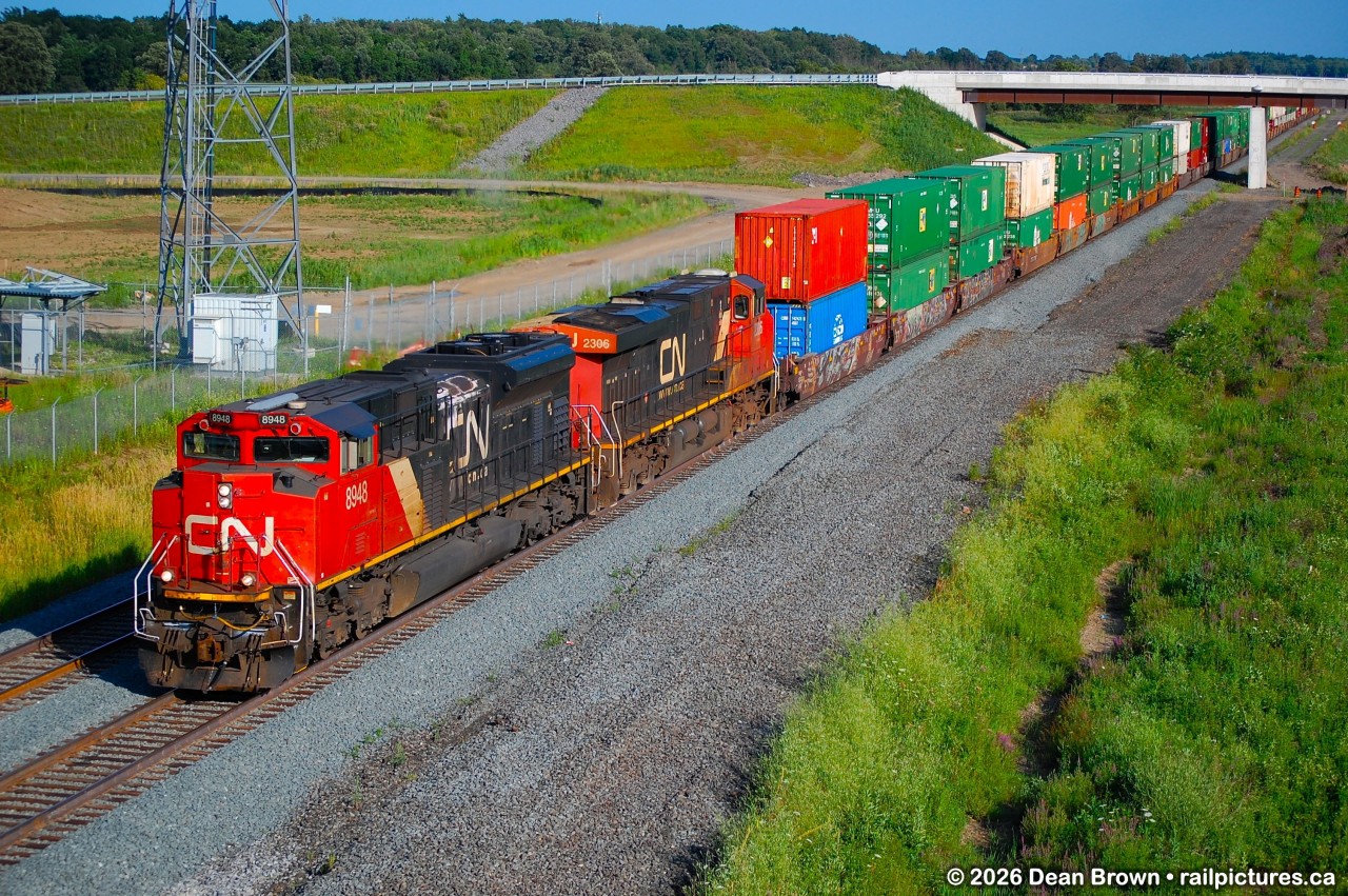 CN SD70M-2 8948 and CN ES44DC 2306 passing through former Ash, now signals removed and double track between Derry Rd. and Tansley.