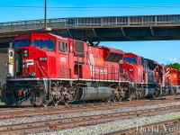 Having yarded their train in New Yard, the Schreiber crew of Toronto to Thunder Bay freight 221 snakes across the East End crossover for the shops with an all EMD lash up led by "Pulling for the United Way" CP 9159. Sister SD9043MAC 9116 trails with a pair of SD40-2's. 
