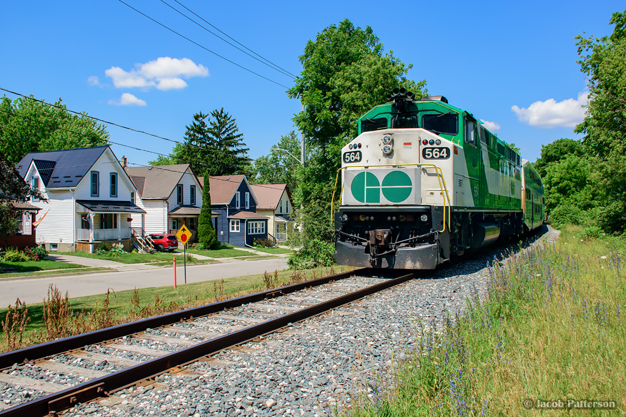 GO Transit 564 shoves on the rear of train 3959, making their way west on the GEXR Goderich Sub to tie down at mile 3 during their layover.  The train will return west to Toronto early in the evening.

GO Transit service to Stratford commenced this past week, with equipment using the Goderich Sub as a pullback during the week to clear the plant at Stratford West prior to departing for Toronto.  On weekends, the run is flipped, starting out of Toronto, returning east in the evening.

While today, Stratford is renowned for theatrical performances of the Stratford Festival, it of course relied heavily on the Grand Trunk Railway during the early years.  While heading up the branch, the equipment passes the GTR shops (behind the photographer,) as well as the residential neighbourhood along St. David Street.  The housing you see here, as well as that on the four streets off to the left/south - McKenzie, Argyle, Stratford, and Nelson Streets - were constructed circa 1909 as part of the GTR's shop expansion, with properties available for GTR shop employees on a rent - to- own basis.  Over a century later, the majority of these properties remain as more expansion comes to the local railway scene.