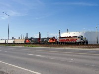 CN YRP051 (AKA the Petro Job) is passing the Suncor refinery in East End Montreal with IANR 4100, CN 7080 & CN 4772 for power.