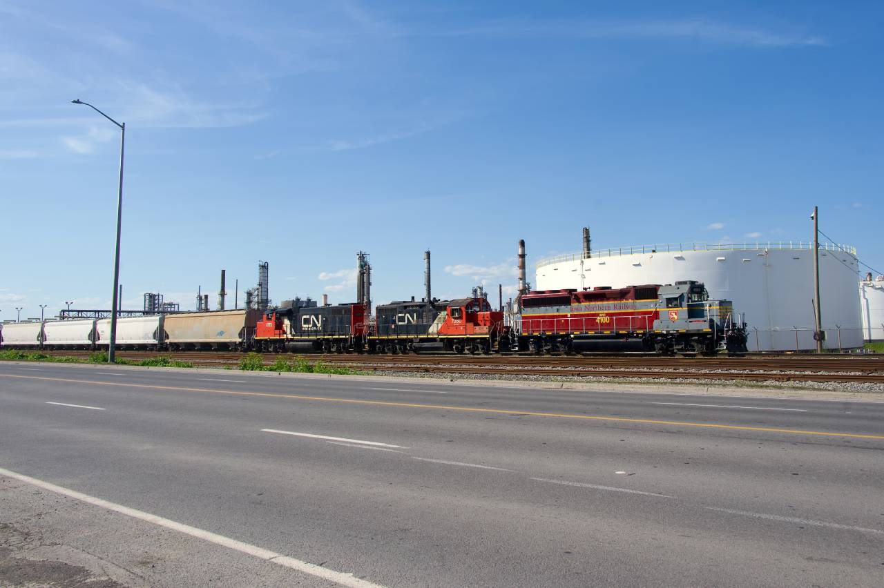 CN YRP051 (AKA the Petro Job) is passing the Suncor refinery in East End Montreal with IANR 4100, CN 7080 & CN 4772 for power.