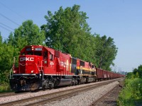 CPKC 9WCA-10 is southbound through LaSalle with ballast loads for the D&H. Power is CP 6222 & KCS 3928.