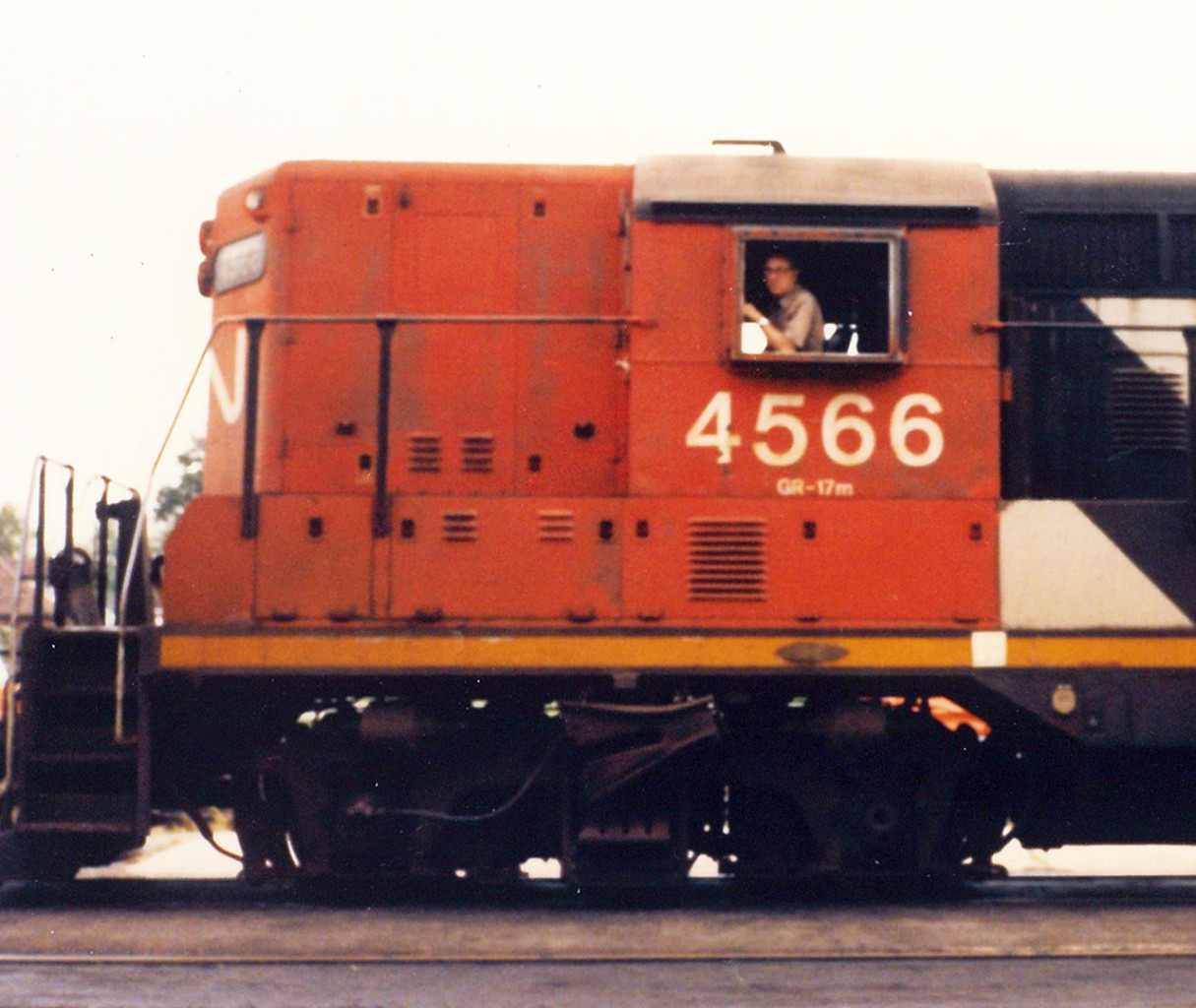 One for the archives. Pulled awhile ago from somewhere, this 40 year old gem. Old 3x5 photo, produced on 35mm film on my parents camera. I suppose this was my very FIRST railfan photo. All at 8 years old, having just lived in Stratford for not even a week on this hot August evening in 1985. Initially, glad I photographed 4566, a high nose GP9 working the yard in Stratford. Wasn't just that, it was the change of scenery. Going from living in the small farming community of Petrolia, to 'big city' Stratford. It seemed bigger to 8 year old me, but the yard was something you could explore back then. But, to get this photo, just out of sight to the left of me was one of the poles holding up the adjacent roof, which joined the main station building and that of the express building. Nearly ran into it running sideways, parents camera in hand...taking the photo of 4566. 


Of note, 4566 was part of the rebuild program that saw CN not only chop the high nose to a minimum, but would also renumber these beauties mid to late 80s and into the 90s. It was built by EMD / GMD, built for freight service only with flexicoil trucks to go on any 'secondary' line within the CN network...making it lightweight. I would assume it ran west to Goderich, and north up the old Newton to Palmerston and beyond.