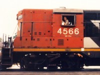 One for the archives. Pulled awhile ago from somewhere, this 40 year old gem. Old 3x5 photo, produced on 35mm film on my parents camera. I suppose this was my very FIRST railfan photo. All at 8 years old, having just lived in Stratford for not even a week on this hot August evening in 1985. Initially, glad I photographed 4566, a high nose GP9 working the yard in Stratford. Wasn't just that, it was the change of scenery. Going from living in the small farming community of Petrolia, to 'big city' Stratford. It seemed bigger to 8 year old me, but the yard was something you could explore back then. But, to get this photo, just out of sight to the left of me was one of the poles holding up the adjacent roof, which joined the main station building and that of the express building. Nearly ran into it running sideways, parents camera in hand...taking the photo of 4566. 
<br>
<br>
Of note, 4566 was part of the rebuild program that saw CN not only chop the high nose to a minimum, but would also renumber these beauties mid to late 80s and into the 90s. It was built by EMD / GMD, built for freight service only with flexicoil trucks to go on any 'secondary' line within the CN network...making it lightweight. I would assume it ran west to Goderich, and north up the old Newton to Palmerston and beyond. 