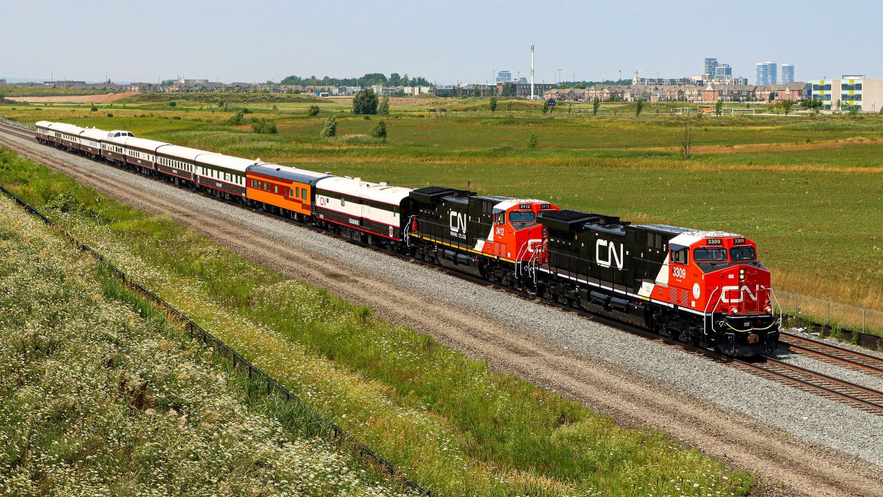 P007 (CN Executive Train) with CN 3309 CN 3412 bright as new pennies at Mile 38.8 Halton Sub. preparing to a stop at Mile 39.2 (former Ash) for a re-crew before continuing westward heading toward Niagara.