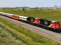 P007 (CN Executive Train) with CN 3309 CN 3412 bright as new pennies at Mile 38.8 Halton Sub. preparing to a stop at Mile 39.2 (former Ash) for a re-crew before continuing westward heading toward Niagara. 


