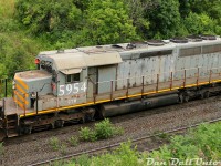 On an eventful trip around Maple on Canada Day in 2022, we stopped by the pullback tracks at CN's MacMillan Yard on the way home before dinner. The usual hump sets have an SD40Q, slug, and another SD40-variant trailing. This set with 6003 and 250 had a nice surprise today: GTW SD40-3 5954! Built as a standard SD40 by GMD in May of 1971 as CN 5185, it was part of a group of retired units rebuilt by Alstom in 1998 to lease to KCS, before being leased and later purchased back by CN (and bestowed GTW 5900-series numbers).<br><br>Unlike the CN 6000-series SD40Q units that had their cabs, noses and other details modified, the rebuilt Alstom SD40-3 units still retain most of their "SD40 look" and CN/Canadian spotting features (handrails, steps, split CN air tanks, nose headlight/cab bell, inertial intake snowshields behind the cab), so this is the closest one will get to a pure original Canadian SD40 on CN today. The large round numbers were no doubt from IC's Homewood Shops inventory. These units also used to have large "CN" logos on the long hood, but when the fleet was stored/retired around 2011 they were buffed off (most units were later reactivated and put back to work).