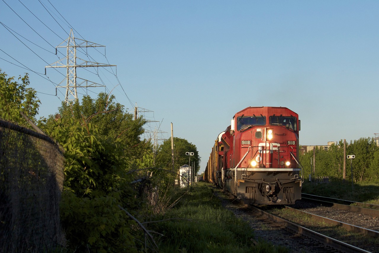 May 2012 for this shot. What I believe was a no.223 train for Winnipeg pulls up on Bartlett with two big 90MAC's for power on a warm spring evening.