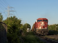 May 2012 for this shot. What I believe was a no.223 train for Winnipeg pulls up on Bartlett with two big 90MAC's for power on a warm spring evening.