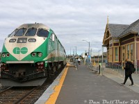 Here's a more modern view of CN's old ex-GTR Maple Station to go with <a href=https://www.railpictures.ca/?attachment_id=59536><b>Todd Steinman's photo</b></a>. Now restored, it's serving as the local GO Transit station in the growing community of Maple, surrounded by lots of new suburban development and even getting a second track/platform for expanded GO service.<br><br>On this day, despite being a Sunday, there were still delays: GO MP40PH-3C 628 was operating on weekend northbound train #6311 (Toronto-Aurora) and was having compressor issues. When I put in an appearance on the scene, the train had pulled into the siding north of Maple GO station at Teston and was waiting in the clear (maybe for the crew to try to fix the issue). The train then pulled south into the station, seen here (sorry passengers, you're going to have to wait for the next train), unloaded its passengers, then departed back into the siding at Teston in the clear. Two GO buses were waiting nearby for passengers to board for the rest of the trip north to Aurora. Southbound train #6916 came and went. Northbound train #6915 came and went. Then 628's consist departed south for Toronto out of service as equipment move #E6913, and didn't enter service again that day.<br><br><br>More at Maple Station:</b><br>CN's Barrie commuter service: <a href=http://www.railpictures.ca/?attachment_id=57396><b>http://www.railpictures.ca/?attachment_id=57396</b></a><br>Barrie commuter with smoke: <a href=http://www.railpictures.ca/?attachment_id=37396><b>http://www.railpictures.ca/?attachment_id=37396</b></a><br>Early VIA Canadian northbound: <a href=http://www.railpictures.ca/?attachment_id=46637><b>http://www.railpictures.ca/?attachment_id=46637</b></a><br>Early VIA Canadian southbound: <a href=http://www.railpictures.ca/?attachment_id=7285><b>http://www.railpictures.ca/?attachment_id=7285</b></a><br>New F40 power: <a href=http://www.railpictures.ca/?attachment_id=8723><b>http://www.railpictures.ca/?attachment_id=8723</b></a><br>North end: <a href=http://www.railpictures.ca/?attachment_id=49237><b>http://www.railpictures.ca/?attachment_id=49237</b></a>