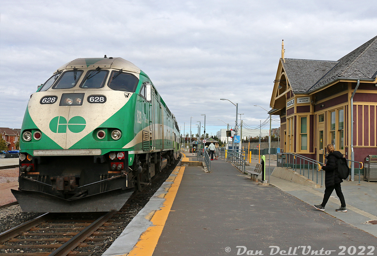 Here's a more modern view of CN's old Maple Station to go with Todd Steinman's photo. Now restored, it's serving as the local GO Transit station in the growing community of Maple, surrounded by lots of new suburban development and even getting a second track/platform for expanded GO service.

On this day, despite being a Sunday, there were still delays: GO MP40PH-3C 628 was operating on weekend northbound train #6311 (Toronto-Aurora) and was having compressor issues. When I put in an appearance on scene, the train had pulled into the siding north of Maple GO station at Teston and was waiting in the clear (maybe for the crew to try to fix the issue). The train then pulled south into the station (seen here), unloaded its passengers, then departed back into the siding at Teston in the clear. Two GO buses were waiting nearby for passengers to board for the rest of the trip north to Aurora. Southbound train #6916 came and went. Northbound train #6915 came and went. Then 628's consist departed south for Toronto out of service as equipment move #E6913, and didn't enter service again that day.

More at Maple Station:
CN's Barrie commuter service: http://www.railpictures.ca/?attachment_id=57396
Barrie commuter with smoke: http://www.railpictures.ca/?attachment_id=37396
Early VIA Canadian northbound: http://www.railpictures.ca/?attachment_id=46637
Early VIA Canadian sorthbound: http://www.railpictures.ca/?attachment_id=7285
New F40 power: http://www.railpictures.ca/?attachment_id=8723
North end: http://www.railpictures.ca/?attachment_id=49237