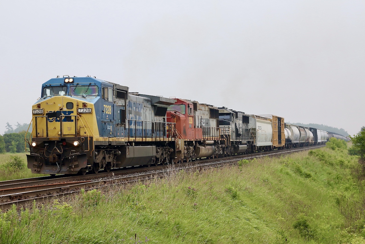 The good old “rent a wreck” days on CN. Don’t think too many of these actually led trains while on CN so this dreary day it was worth running out to Tansley to get it, especially as no CN units on the train. I miss all these unwanted Dash-8 leasers, as well as the unwanted BNSF ex ATSF SD75’s. The NS SD60 rebuild was just a bonus. I could definitely use some of this variety today.