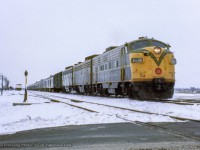 CNR pool train 14, the "International Limited," is seen departing Belleville for Montreal behind an A-B-B set of GMD FP9 locomotives.

<br><br><i>John Freyseng Photo, Jacob Patterson Collection Slide.</i></i>