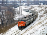 On February 11, 1972, a <a href=https://churcher.crcml.org/circle/Wreck%20Details/1972Morrisburg.html>derailment at Morrisburg on the Kingston Sub </a> and resulting propane tank explosions shut down the mainline for a short time forcing CN trains to detour via the CPR.  Rounding the curve on approach to Leaside at the top end of the Don branch of the Belleville Sub, CN 50, the Rapido, is just one of many detours to head for Montreal via Smith's Falls.<br><br><i>Scan and editing by Jacob Patterson.</i>