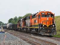 Another CN oddity. CN 4990, with no CN markings and BNSF still fully visible on the nose, leads CN 583 crossing over at Paris West to gain access to the north service track and Paris Yard. CN 583 is a turn job from London to Paris and return, switching industries in Ingersoll, Woodstock, and Princeton along the way. I'd love to know how CN 4990 got released for service in it's current appearance; the shop must have ran out of spray paint.  