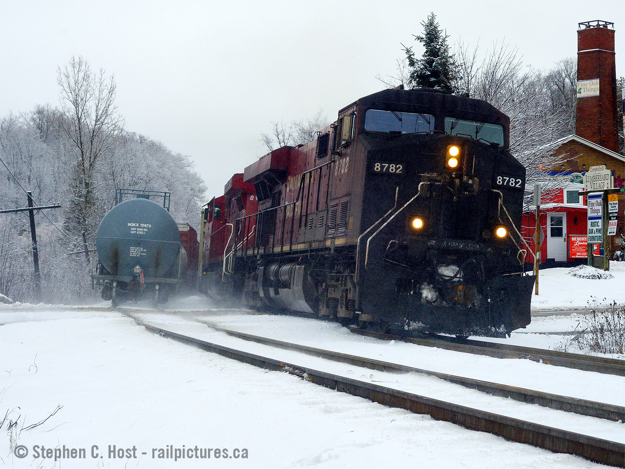 Part 3/3. So on this nice pretty Saturday morning with no plans I went out to capture Train 236 in the snow. After capturing them on the hill on the curve, at a blistering 1 MPH seen here in part 1 and after a quick meet with 237 seen in part 2 I was delighted that 237 was a fast and short train. After 237 blasted by in about 30 seconds, I was in position hoping, praying, that the locomotive on 236 wouldn't be so far over that I couldn't frame the old brick works (also lumber and coal company) in the shot, and bam, there it was. Click Click and goal achieved. Little did I realize i'd get a full meet sequence at the same time. We recently had some great discussions on this place here on Arnold's recent posting with great info from Mr. Bowman and Terry O'Shell who are both right.  Jacob did the research a couple years ago and posted this  here in this 1950's shotAnd here's some more:
Last run of CPR #21, Bill Thomson
Last run again, this time in colour. Note this means Bill carried two cameras and switched cameras to get the going away shot in colour.
Modern view #1
Modern view #2
Steam by Bill Thomson
CP F units Bill Thomson
I mean if you really want to go digging into Bill's stuff at Campbellville,  This google search will do it>/a> but just click someone's name on the site to dig into their profiles.. we lost bill in 2020 but the gold he's shared with us is all there, and campbellville was one of his, and still is one our favorite spots to go for us locals!

Note the caboose was removed from the property last year. They tried to sell it with the business that operated in it and I guess that failed to pan out.