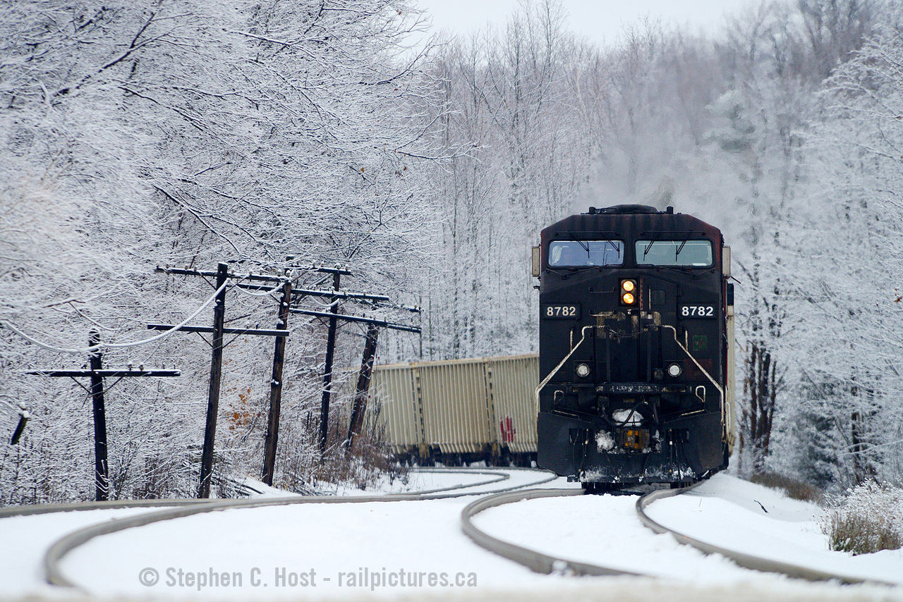 Part 1/3 - After posting Part 1> where a lively discussion ensued, I figure during our times of extreme warmth I'll cool everyone off with some January winter action. So pictured we have 246 (236?) grinding up the hill on what Mr. Ron Bowman calls Angel's Rest - the steepest part of the grade and 236 is on their knees. They were doing about 1 mile per hour, and this all black locomotive was coming toward me while train 237 had just cleared the junction and was coming behind me.I was able to take the time to capture a photo that shows off the "Steepest part of the grade". Speaking of which, has everyone gone digging to find Mr. Ron Bowman's notes he adds to many photos? If you click someone's profile it will show you how many comments were made, and Mr. Bowman has graced us with his railroading memories for quite a long time now with over 700 comments, along with many many others. Thank you to all who continue adding to our discussions - it's not just about the photos, it's about the memories and history too.On that note I want to make an addition that shows comments folks have left to help bring the discussions forward, but for now, i'll direct folks to use google such as the following query RonaldB site:railpictures.ca to help you find them.