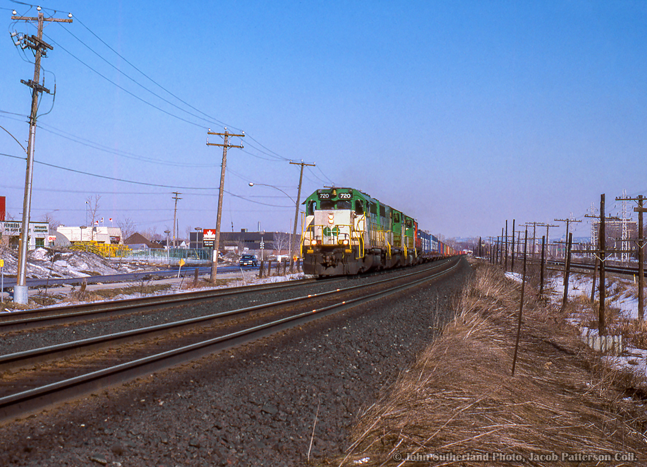 A set of leased GO Transit units head train 505 west out of Montreal passing through Pointe Claire.  It is 1430h on Sunday, March 6, and the units need to be back in Toronto for the Monday morning commuter runs.
More GO leasers:
1980 Reg Button
1985 Arnold Mooney
1988 John Reay
John Sutherland Photo, Jacob Patterson Collection Slide.