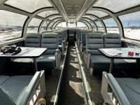 <b> What more could you ask for? </b> <br>
Camera, radio, timetable, front seats, great on-board service, and no one else in the dome! <br>
For 90% of my recent trip to and from Churchill April 28 to May 2 I had one of the two front seats with table. <br>
There were only three people in Sleeper Plus Class allowing for use of 'the best seats in the house' for most of the journey. <br>
VIA 8503 Skyline was like having my own private car on this trip! :-)