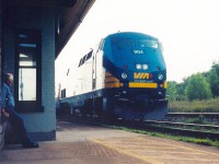 Digging back through old photos I had taken and then produced from my old 35mm camera. Came across this one, with a VIA train approaching it's station stop at the historic Port Hope station. Guess this is as good as it gets shooting the now 'old' P42's. as The gentleman leaning against the limestone beside the old operators bay is the 'station agent'. There to open and close the waiting room for every train that stopped here for passengers. Not what it used to be, but a touch of nostalgia was had this evening.  