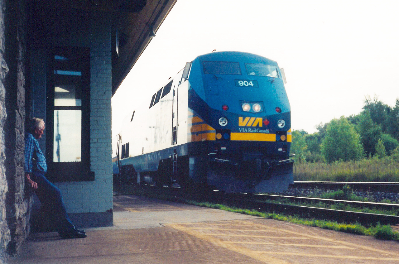 Digging back through old photos I had taken and then produced from my old 35mm camera. Came across this one, with a VIA train approaching it's station stop at the historic Port Hope station. Guess this is as good as it gets shooting the now 'old' P42's. as The gentleman leaning against the limestone beside the old operators bay is the 'station agent'. There to open and close the waiting room for every train that stopped here for passengers. Not what it used to be, but a touch of nostalgia was had this evening.