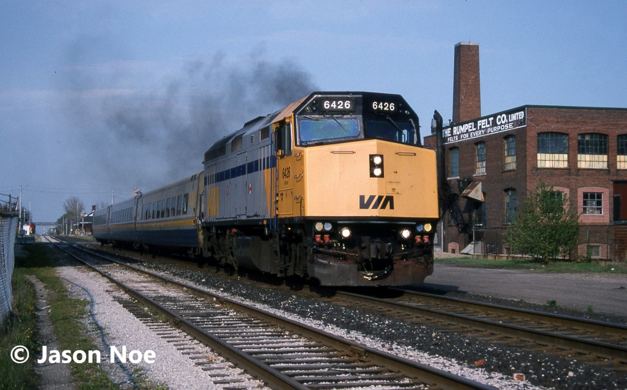 VIA Rail train 689 is pictured departing from the Kitchener, Ontario station after completing its stop with F40PH-2 6426. The Sunday evening train is heading westbound to Stratford and London over the CN Guelph Subdivision.