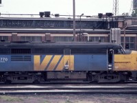 A side view of Via Rail MLW FPA-4 6770 in July of 1982. Note the railroad buildings and industrial scene behind the unit. Not the glitzy and glassy Toronto of today. What a time to be photographing trains back then.