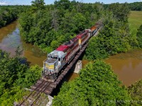 CN L58921 23 making a morning southbound run on Vankleek spur with Iowa Northern duo IANR 3811/3806 for power, lifted 5 empty gons from Ivaco on Monday and set off 4 grain loads at Les Grains JP on their way down to Coteau on Tuesday. (2026/06/23)