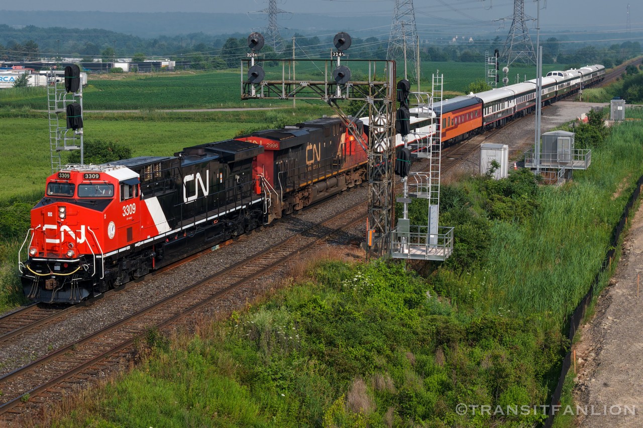 CN P00731 17 with CN 3309 and 2996 for power, practicing the route for the Niagara wine tasting excursion on Jul 20. 

Consist: CN 3309/CN 3412/CN 1710 ‘Peace River’/PPCX 800045 ‘Caritas’/IC 800210 ‘Fleuve St-Laurent’/CN 101 ‘Sandford Fleming’/CN 120 ‘Sherbrooke’/CN 99 ‘Shawnee Forest’/IC 101314 Stephen A. Douglas/CN 1059 ‘Mississipi River’/IC 101315 ‘K-Shian - Skeena River’/IC 800413 ‘Whiteshell’
