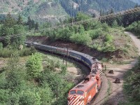 <br>
<br>
   Red  VIA  F's !
<br>
<br>
  ex CP FP9A #1422 –  leased CP Rail GP9 #8521 – Ex CP FP9A #1407 – VIA (ex CP) F9B #1961 (DH).
<br>
<br>
 Near Spuzzum (?), view from the T C H, Daily VIA #2, May 14, 1980 Kodachrome by S.Danko
<br>
<br>
     <a href="http://www.railpictures.ca/?attachment_id=  53894 "> China Bar   </a>
<br>
<br>
sdfourty

