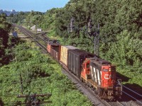 CN 4537 is eastbound at Bayview Junction, Ontario on August 12, 1987.