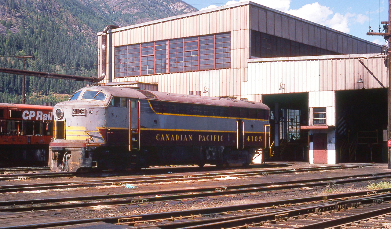 CP 4105 is outside the CP diesel shop in Nelson, British Columbia on July 30, 1974. While the lighting is not the best for the shadows, considering the Master Mechanic had 4105 moved out of the shop for my photos, I am thankful for what I have.
