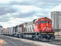 CN 2308 is eastbound in London, Ontario on March 25, 1981.