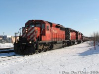On a trip down to "Steeltown" one winter day, a stopover was made at Campbellville to shoot some morning CP action on the Galt and Hamilton Subs. After northbounds #427 and #247 cleared the Hamilton Sub and headed east, CP #426 "The Steel Train" crests the grade and makes a left at Guelph Junction, swinging down the Hamilton Sub with SD40-2's 5775, 5989 and SOO SD60 6053 in the lead. We would catch up with this train later at Hamilton Junction/Desjardins, waiting on a meet with an northbound heading up the Hamilton Sub with yet <a href=http://www.railpictures.ca/?attachment_id=11148><b>another SD40-2 leader</b></a>.<br><br>Stops that afternoon included SOR's Stuart Street yard to shoot their recently reactivated SW1200RS 1359, and the unit on a local job running around on <a href=http://www.railpictures.ca/?attachment_id=1217><b>the N&NW (in "The Hole")</b></a>, switching Railcare, <a href=https://www.railpictures.ca/?attachment_id=3109><b>Stelco</b></a> and Parkdale Yard.