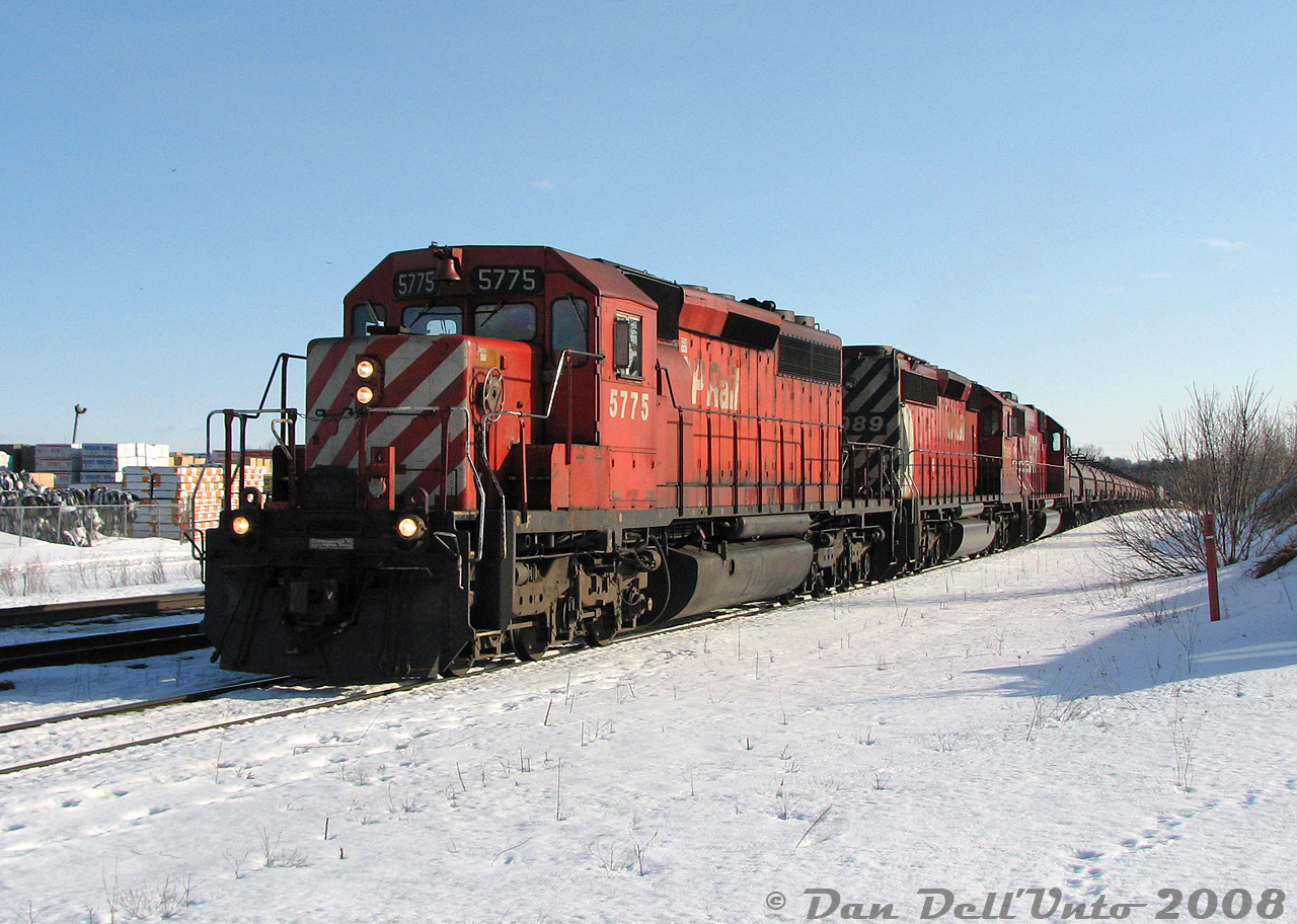 On a trip down to "Steeltown" one winter day, a stopover was made at Campbellville to shoot some morning CP action on the Galt and Hamilton Subs. After northbounds #427 and #247 cleared the Hamilton Sub and headed east, CP #426 "The Steel Train" crests the grade and makes a left at Guelph Junction, swinging down the Hamilton Sub with SD40-2's 5775, 5989 and SOO SD60 6053 in the lead. We would catch up with this train later at Hamilton Junction/Desjardins, waiting on a meet with an eastbound heading up the Hamilton Sub with yet another SD40-2 leader.

Stops that afternoon included SOR's Stuart Street yard to shoot their recently reactivated SW1200RS 1359, and the unit on a local job running around on the N&NW (in "The Hole"), switching Railcare, Stelco and Parkdale Yard.