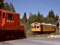 On Vancouver Island, the north end of the siding at Shawnigan on CP’s E&N Victoria subdivision crossed Renfrew Road at the north end of Shawnigan Lake, an area known as Mason’s Crossing for a nearby convenience store. On Tuesday 1977-06-07 at 1215 PDT, that is where Sperry car SRS 127 tucked away in the siding to meet northward freight train No. 51 led by GP9 CP 8531.