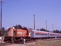 In recognition of a century since the company was founded, Canadian Pacific organized Family Days open house opportunities at significant facilities for employees, and at Coquitlam Yard in Port Coquitlam, that included train rides on the X-Yard running lead.  On Sunday 1981-08-09, MLW S-4 CP 6518 with three coaches and a caboose took riders from the west end of the yard to the east end and back on a hourly schedule.
