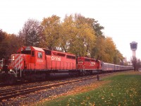It has been long enough already that most of us have forgotten about the once popular Circus Train that made stops all over North America. And many of todays fans weren't even old enough to hold a camera since it last made Niagara back in 1994.
I posted a Circus Train shot here approaching the South Siding Switch, Chippawa, a long time back with telephoto, I switched cameras; then backpeddled like mad in order to capture the train using wide angle. Back then, my tele and wide angle meant using two different cameras; unlike todays easy digital.
Interesting shot, though, of a train and location long forgotten.
Due to the poor weather, Reg Button was the only other photographer with me in this afternoon of scurrying.
But it all paid off, as this is the last Circus Train I have ever seen.  
The track in the foreground is still in place as the South Siding Switch for the twice weekly local out of Welland that comes down to service business at Chippawa. Track to downtown Niagara Falls was removed by 2001.
Niagara Falls has grown its tourist industry to the extent I don't even think the former Minolta tower is visible from this location, having now been crowded out by hotels.
