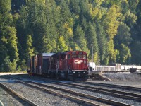 Head of the class CP 5000 assisted by 2291 are seen rolling eastward on approach to the old station at Nelson, BC. The 5000 was delivered to CP on 5/12/2013 from Progress Rail, Mayfield, KY. It is an SD30C-ECO, rebuilt from the old CP 5950. Trailing unit is classed as a GP20C-ECO.
Nelson sure has changed over the years. Besides the loss of that classic Shop facility, it appears downtown to be a refuge for wayward hippies. :o)