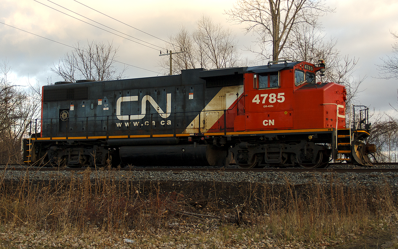 Nothing like just getting out and seeing what's out there. At the end of Merrit Ave., is where power is usually stored for local CN 514. This time, GP38 numbered 4785 sits in the setting sun, under threatening skies.