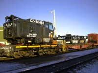 <b> Hook me up! </b> <br>
CN 50483 is an American model 840 DEH (Diesel powered, Electric traction motors, Hydraulic swing) locomotive crane, serial number L-4353, built in 1986. It was shipped new to CN in Toronto, ON in April 1986. <br>
It is seen here all tied down and ready for in-train transit to its next work location in the yard at CN's Transcona Work Equipment repair facility after major repairs were completed.