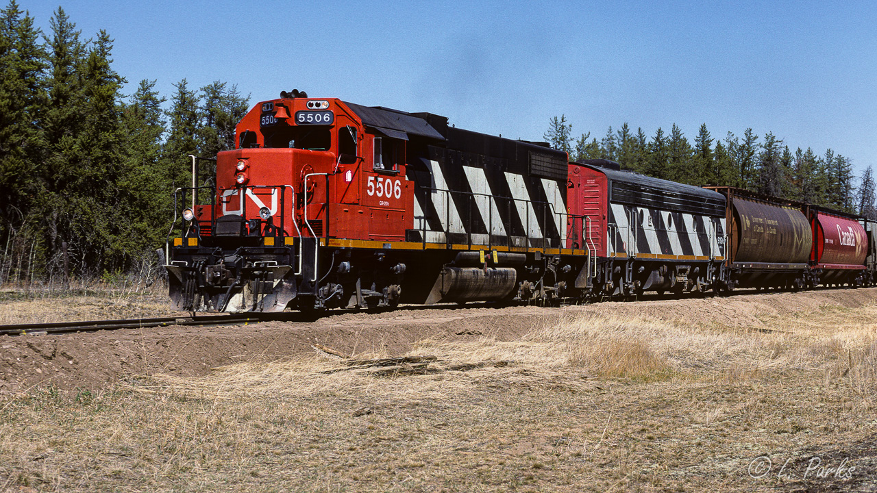 Spring of 1988, a time of much change on the Coronado. Combo's like this were not uncommon at the beginning of 88 , there were also a number of instances with a GP38 and a beetle B unit. The first big change came in May with the renumbering of the GP38's into the 47 and 4800's. I caught my last, the 5529, on October the 11th. Next, starting in summer, F unit and GP9 number's started to dwindle. Summer of 89 there were no F units left and any GP9's remaining in service only trailed. The older GP9's quite often helped with their newly re-built replacements, the 4000 and 4100's. In just over a year, many of the familiars went through some sort of cosmetic surgery or were gone for good. Even the roadbed was getting an update. The sub-grade has been dumped and leveled into place. Next will come what seemed like an endless chain of ballast cars. In the end, the whole tracked must have been raised several inches. Looked great! Photo taken at mile 24.4 at 14:30.